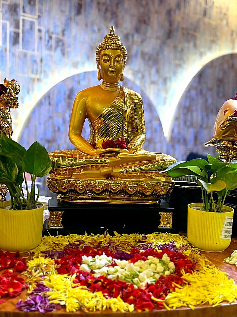 Golden Buddha statue in the spa reception