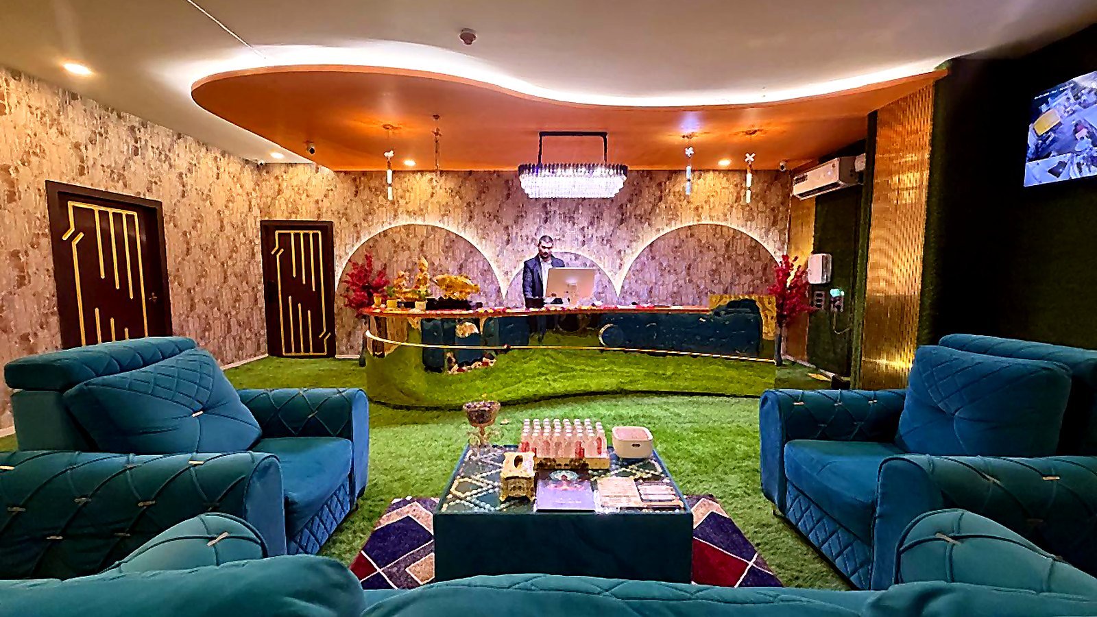 Reception and lounge at Royal International Spa, Guntur