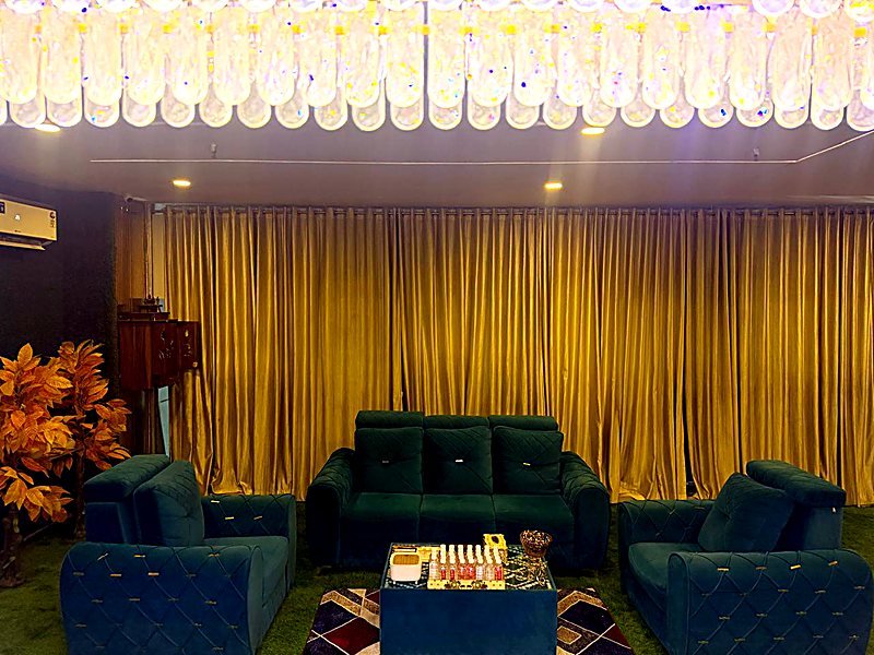 Gold-curtained relaxation lounge