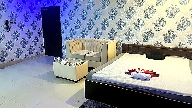 VIP suite with lounge seating at Royal International Spa Guntur
